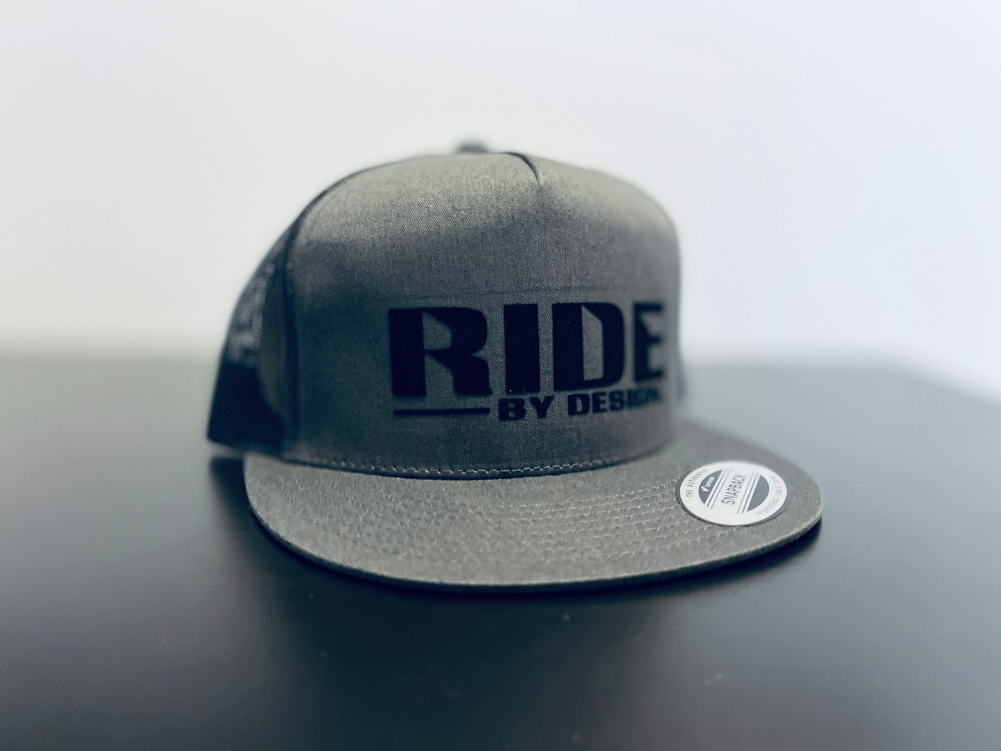 Ride by Design - Black Cloth Original Hat